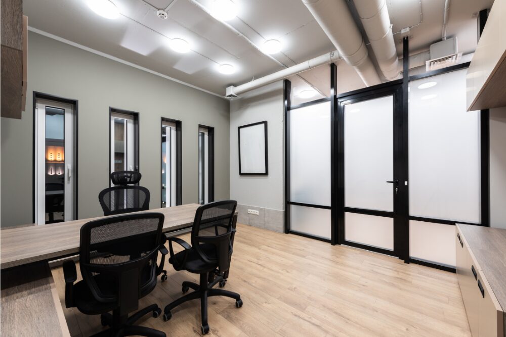 Kelvin Electric electrician installs energy-efficient indoor office lighting to improve productivity and reduce energy costs.