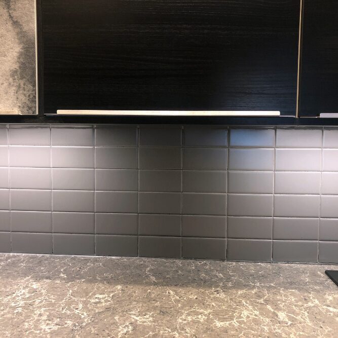 Kelvin Electric installed modern under-the-counter lighting in a residential kitchen to improve style and functionality.